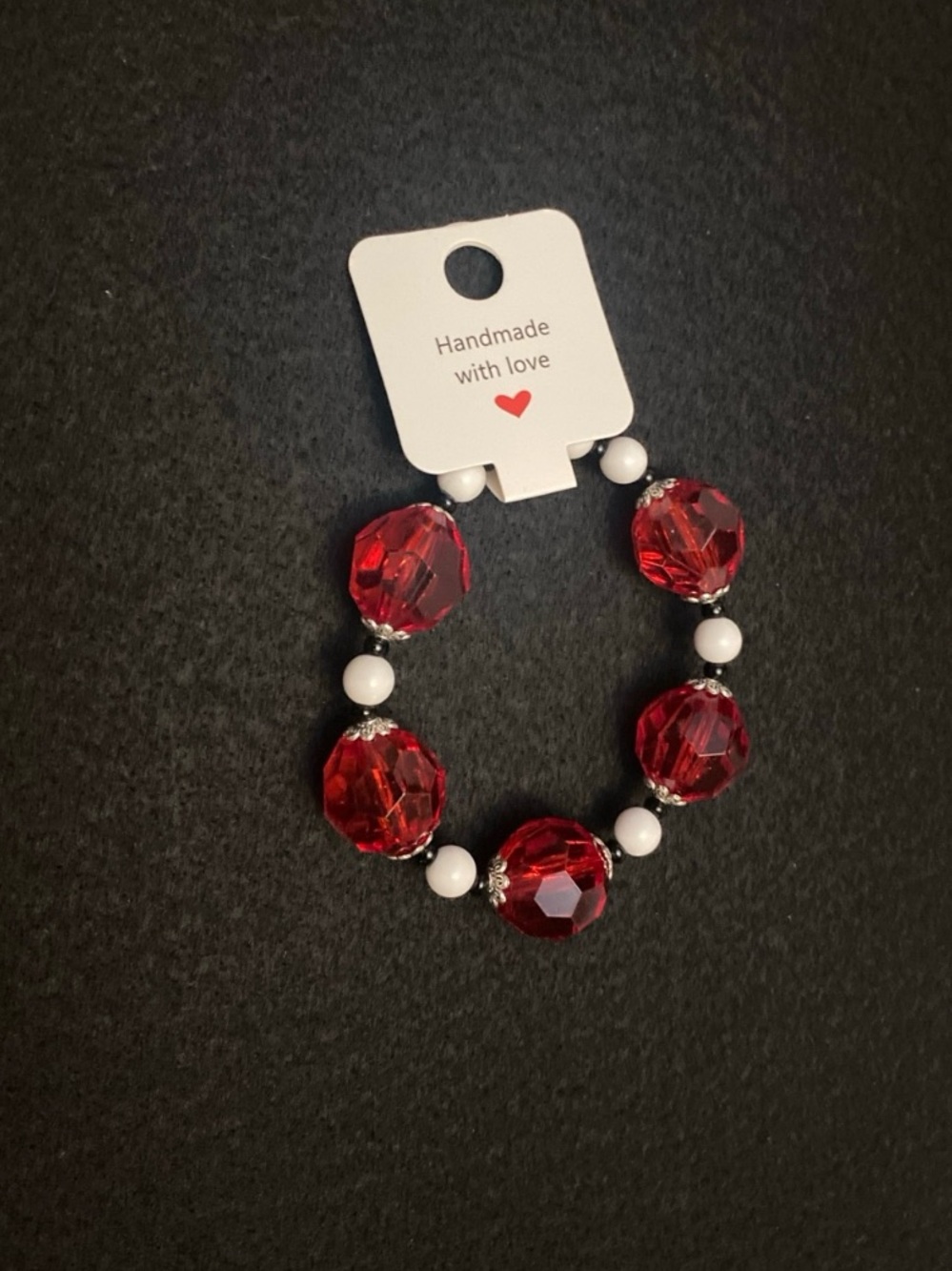 Red Faceted Bead Stretch Bracelet with White Accent Beads